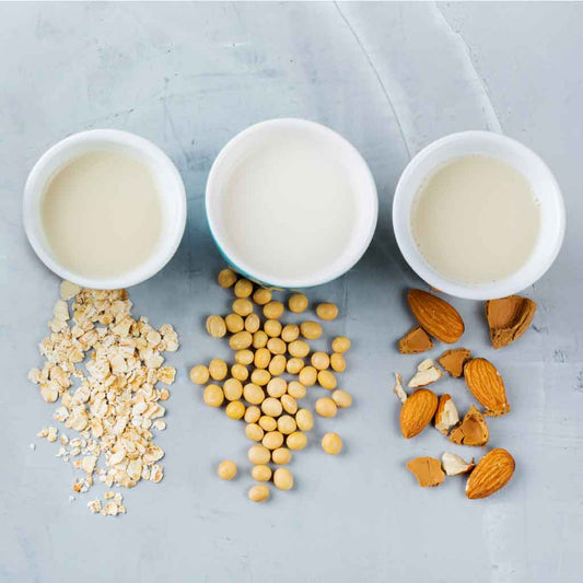 alternative milk oat almond and soy bean milk